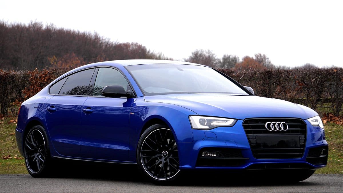 Blue Audi A5 Sportback parked on a country road